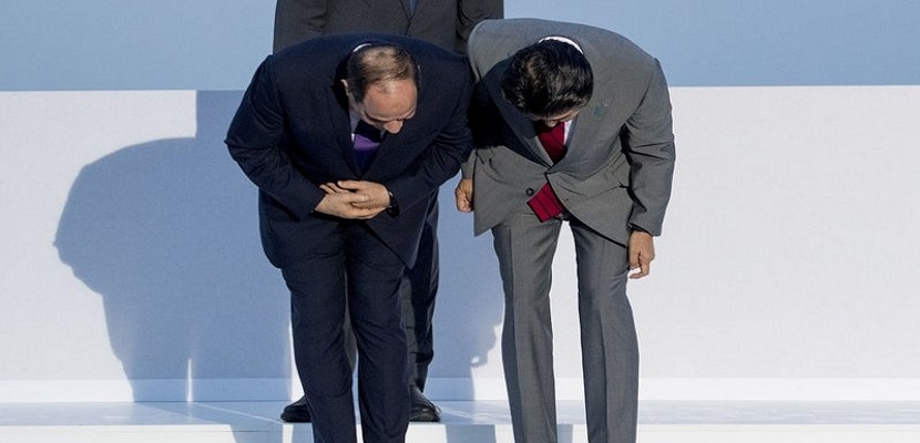 حقيقة  صورة الرئيس المصري ورئيس الوزراء الياباني التي حيرت العالم